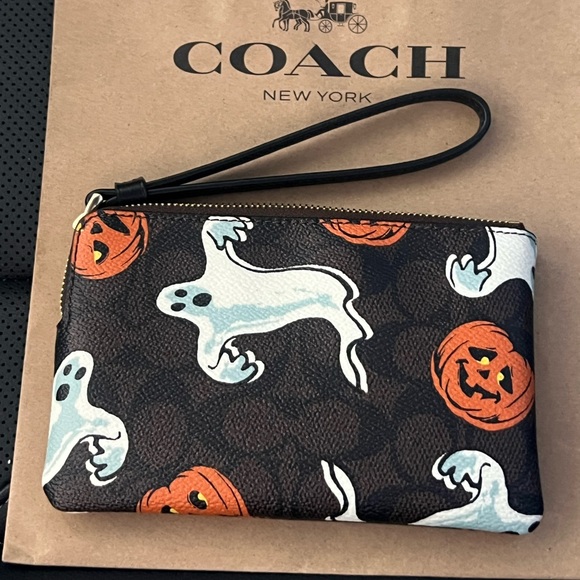 Limited Edition Coach Brown Wristlet with Ghosts and Pumpkins - Picture 1 of 3